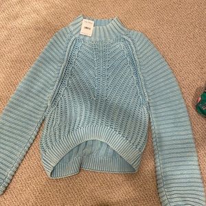 Blue sweater. Free people. Size small. Brand new